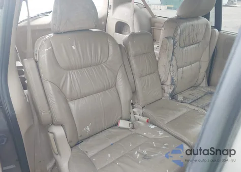 2010 Honda Odyssey Touring z USA, uszkodzony, nr VIN 5FNRL3H90AB047535